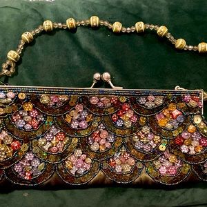 Stunning bejeweled clutch with optional strap